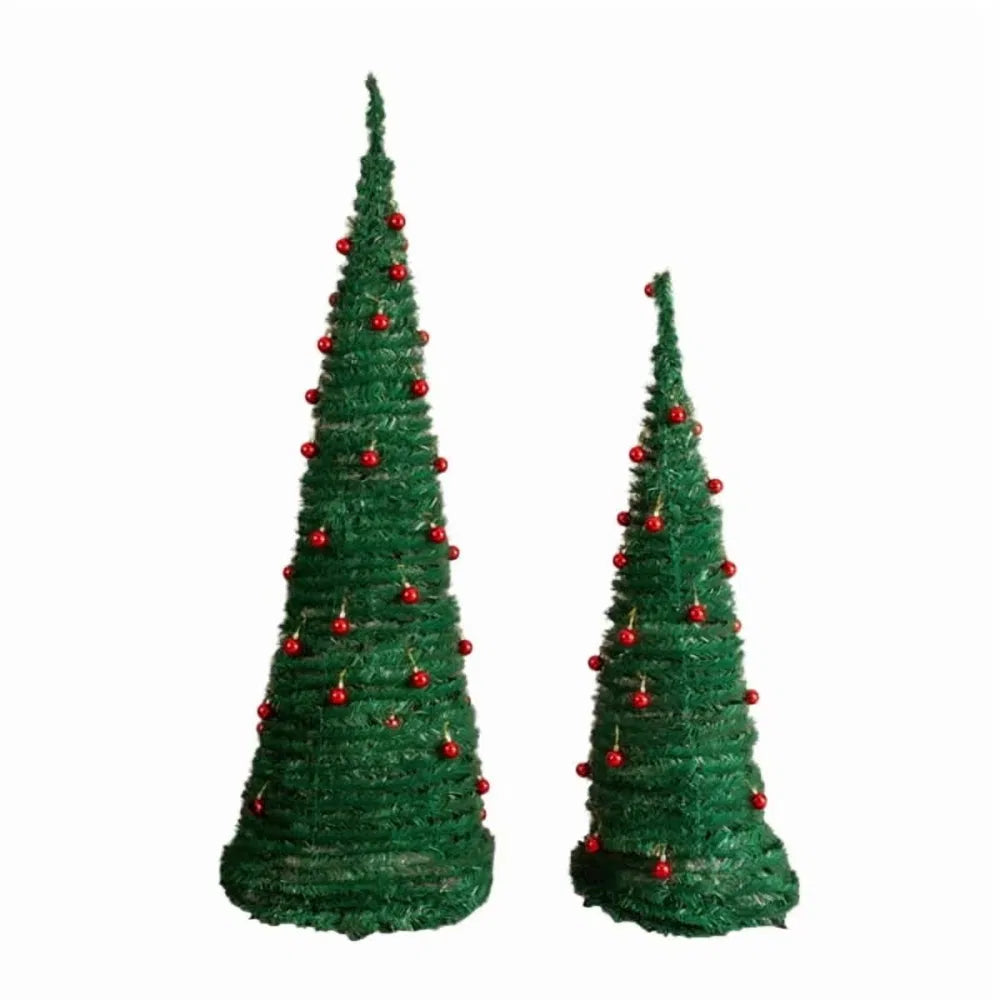 Twee pop-up kerstbomen met rode ballen