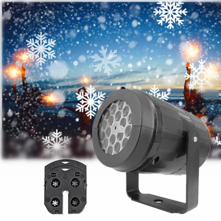 Sneeuwvlok projector verlicht een gevel