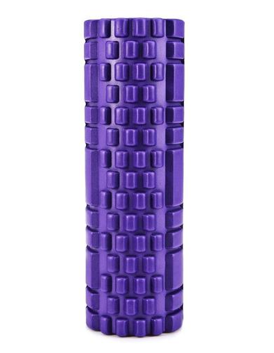 Paarse foam roller met noppenstructuur
