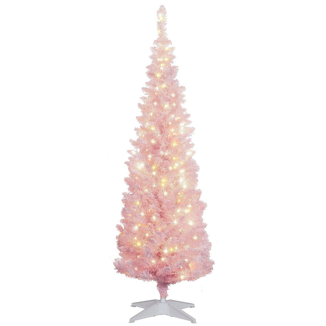 Kleine roze besneeuwde kerstboom met lichtjes