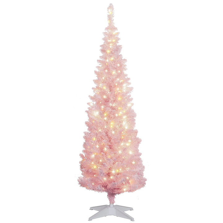 Kleine roze besneeuwde kerstboom met lichtjes