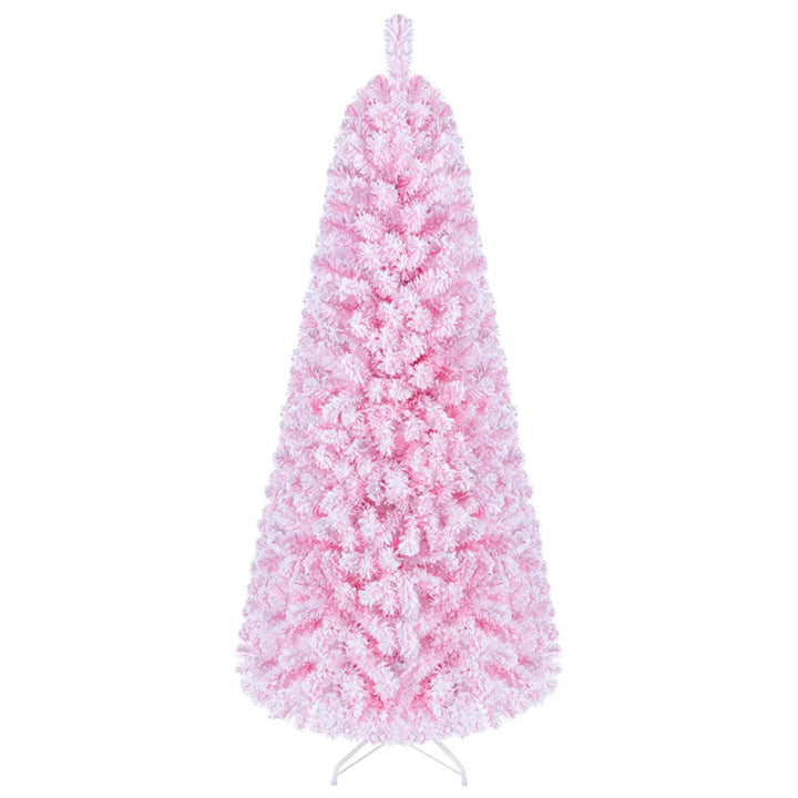 Roze besneeuwde kerstboom met warm licht