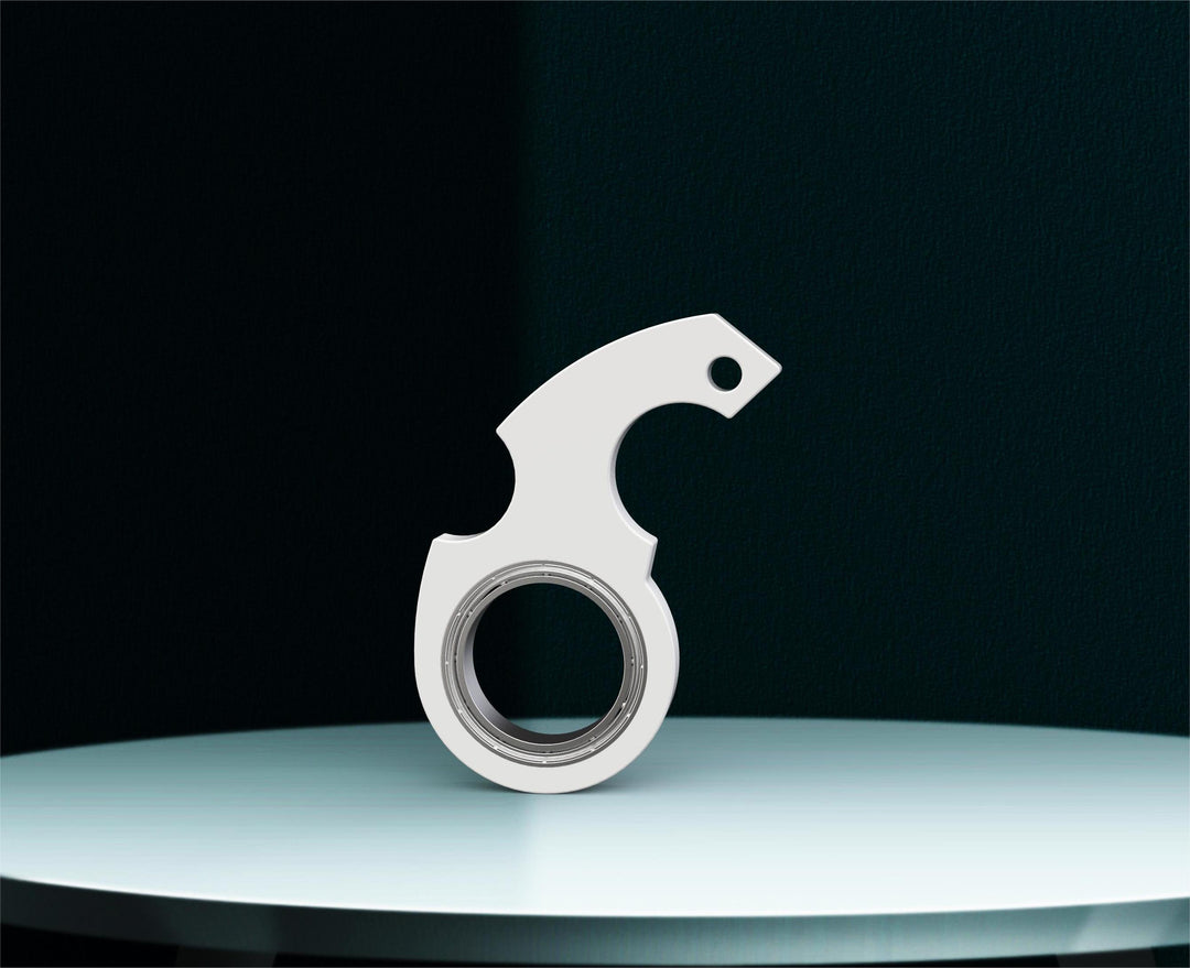 Rode fidget spinner sleutelhanger aan sleutelbos