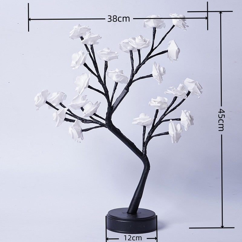 Rozenboom lamp met oplichtende roze rozen