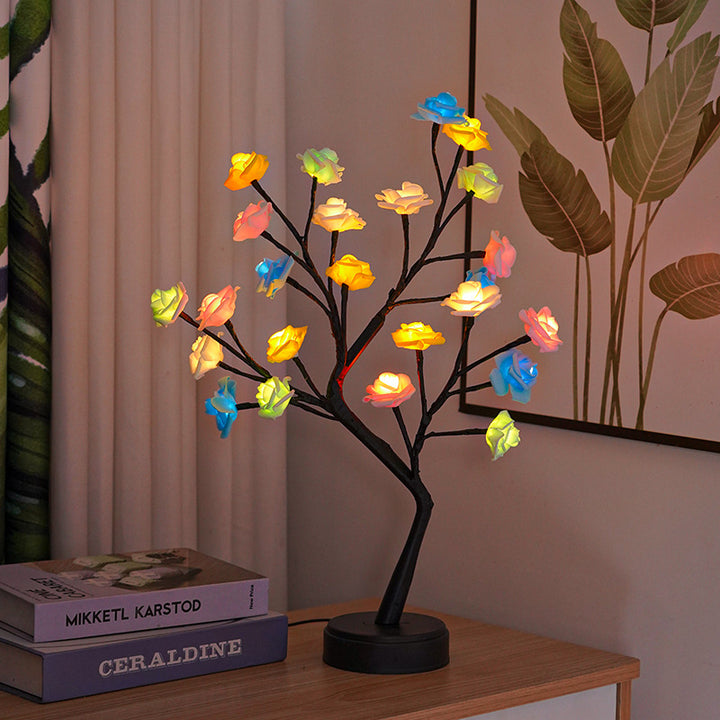Rozenboom lamp met oplichtende roze rozen