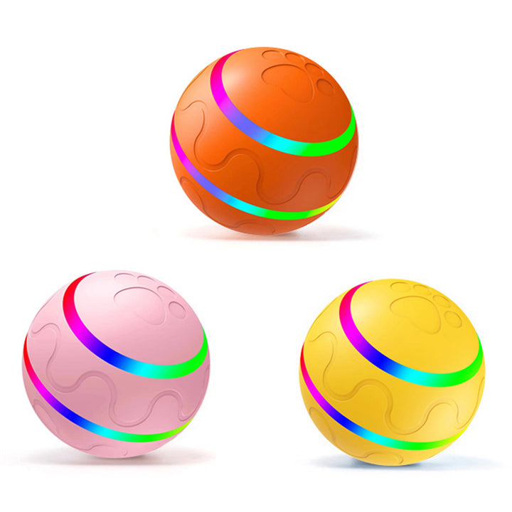 Oranje lichtgevende kattenbal op de vloer