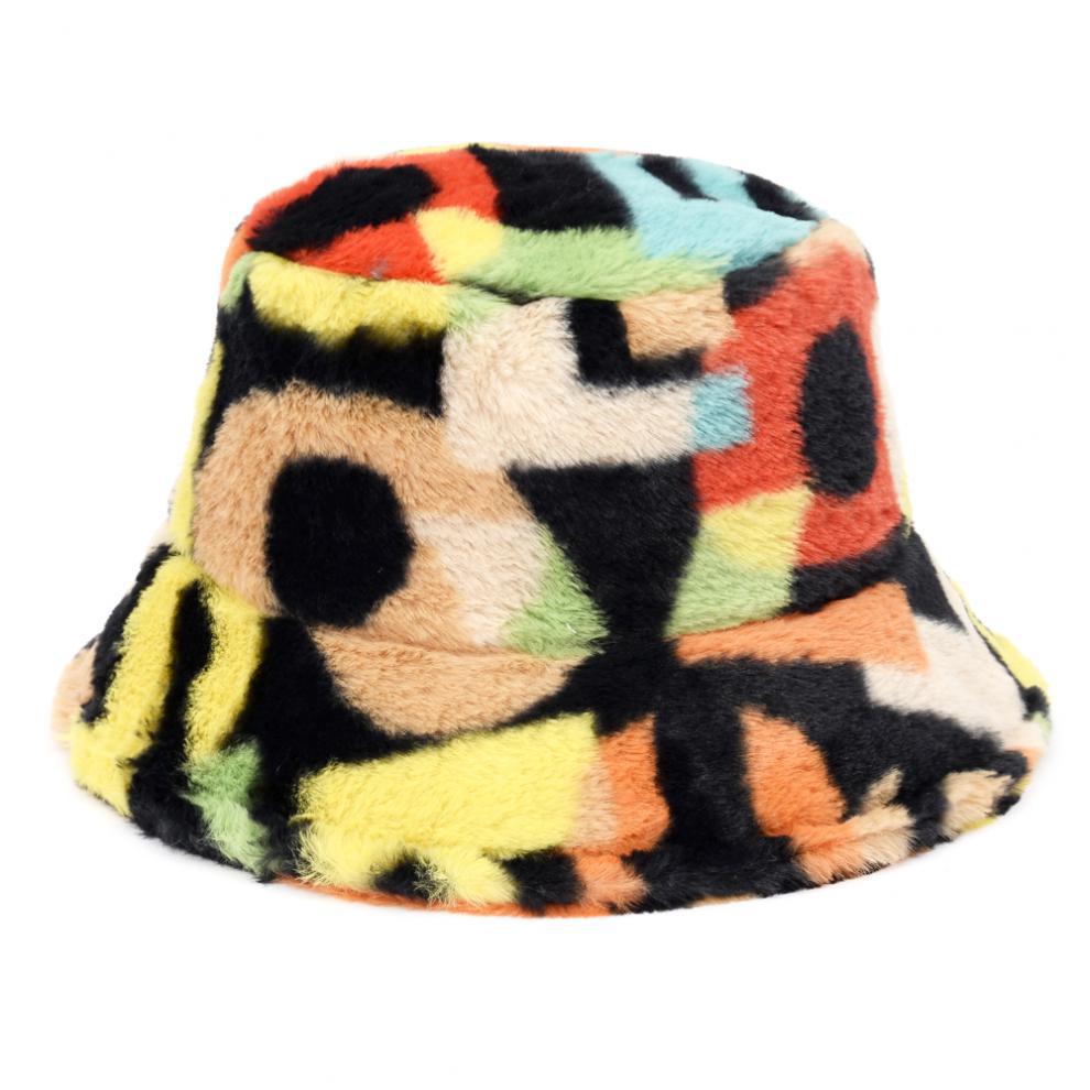 Pluizige bucket hat met koeienprint