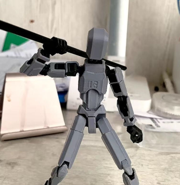 Oranje 3D-geprinte robotfiguur in actiehouding