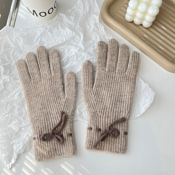 Warmteparadijs Geribde gebreide handschoenen met een strikje