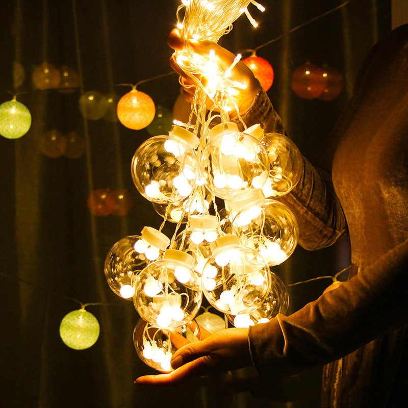 Lichtgordijn met heldere bollen voor raam