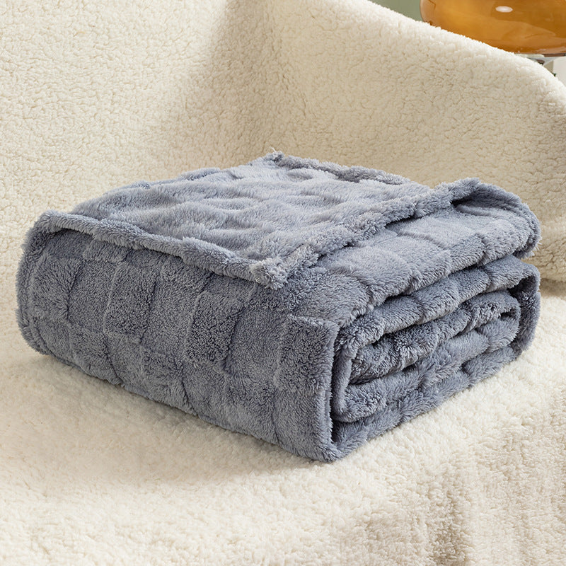 Dikke geruite pluche plaid op de bank