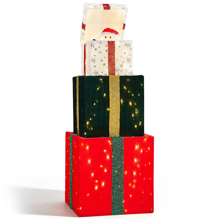 Bewegende toren van verlichte kerstcadeaus