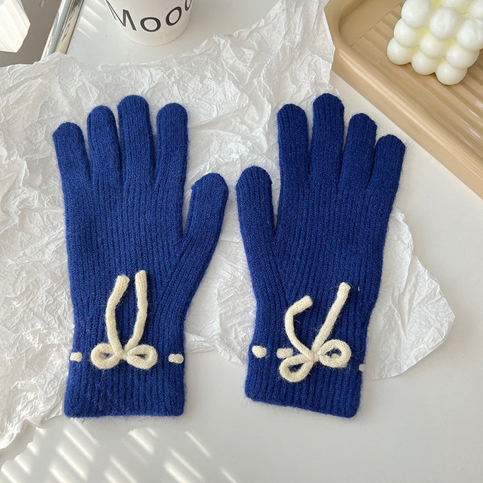 Warmteparadijs Geribde gebreide handschoenen met een strikje