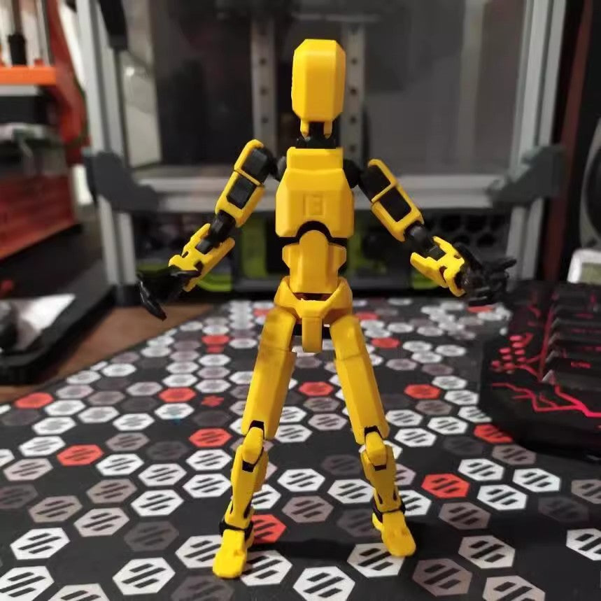 Oranje 3D-geprinte robotfiguur in actiehouding