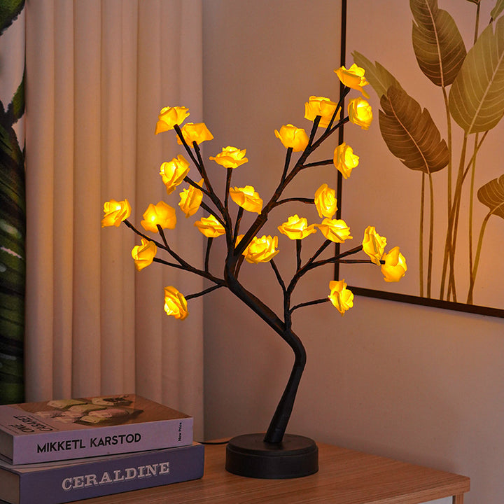 Rozenboom lamp met oplichtende roze rozen