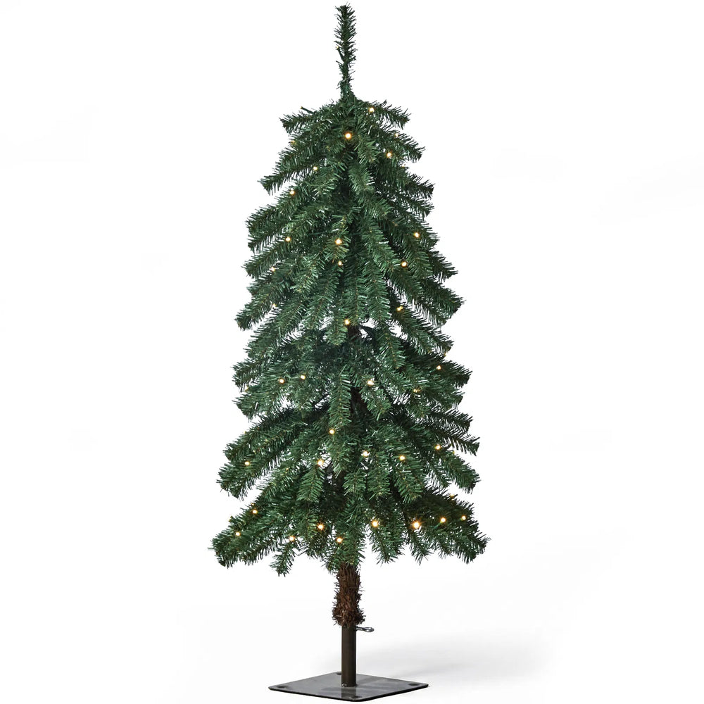 Kleine kunstkerstboom met warmwitte lampjes