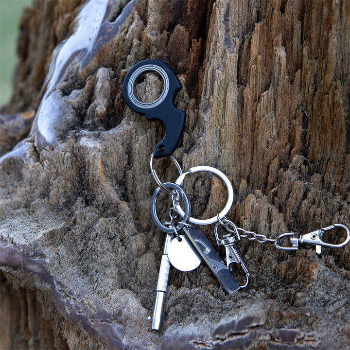 Rode fidget spinner sleutelhanger aan sleutelbos