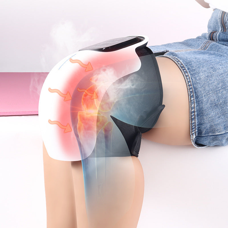 Wit draadloos massageapparaat om een knie