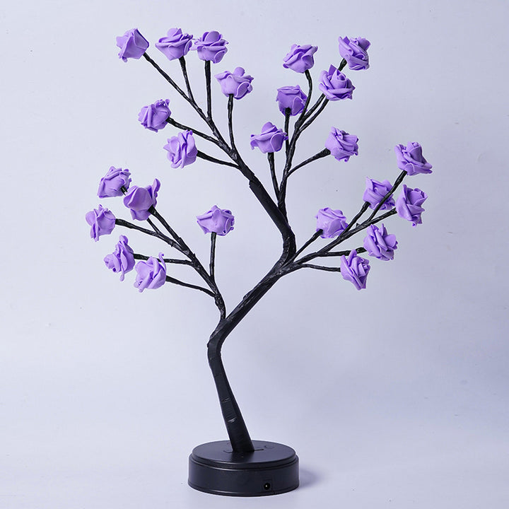 Rozenboom lamp met oplichtende roze rozen
