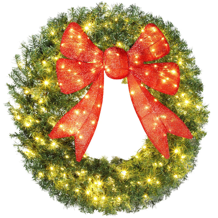 Grote verlichte kerstkrans met rode strik