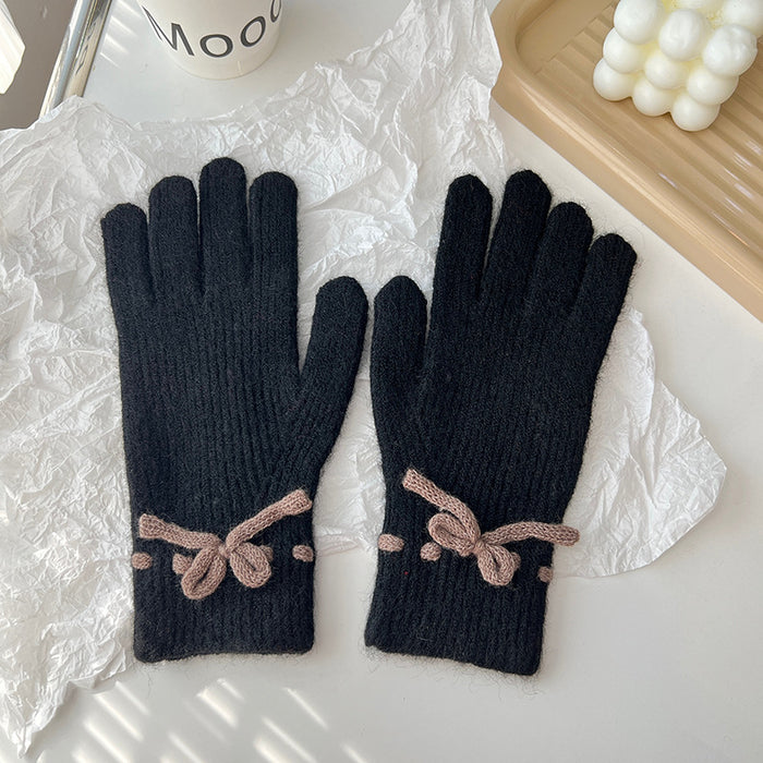 Warmteparadijs Geribde gebreide handschoenen met een strikje
