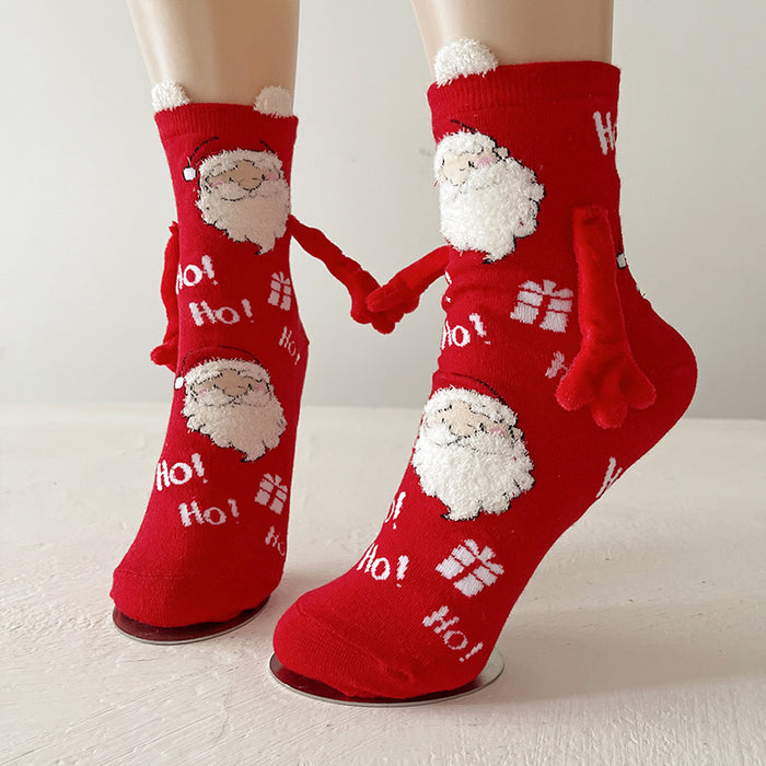Warmteparadijs Kerstsokken met magnetische handjes voor koppels