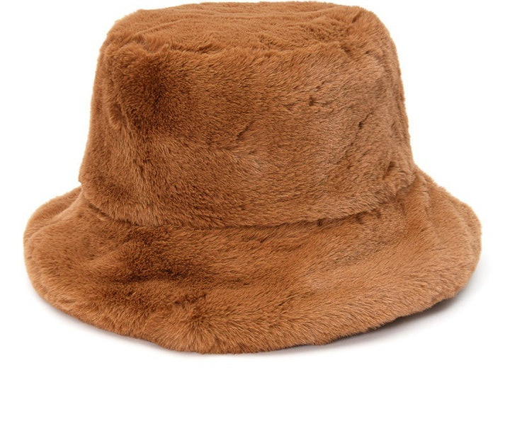 Pluizige bucket hat met koeienprint