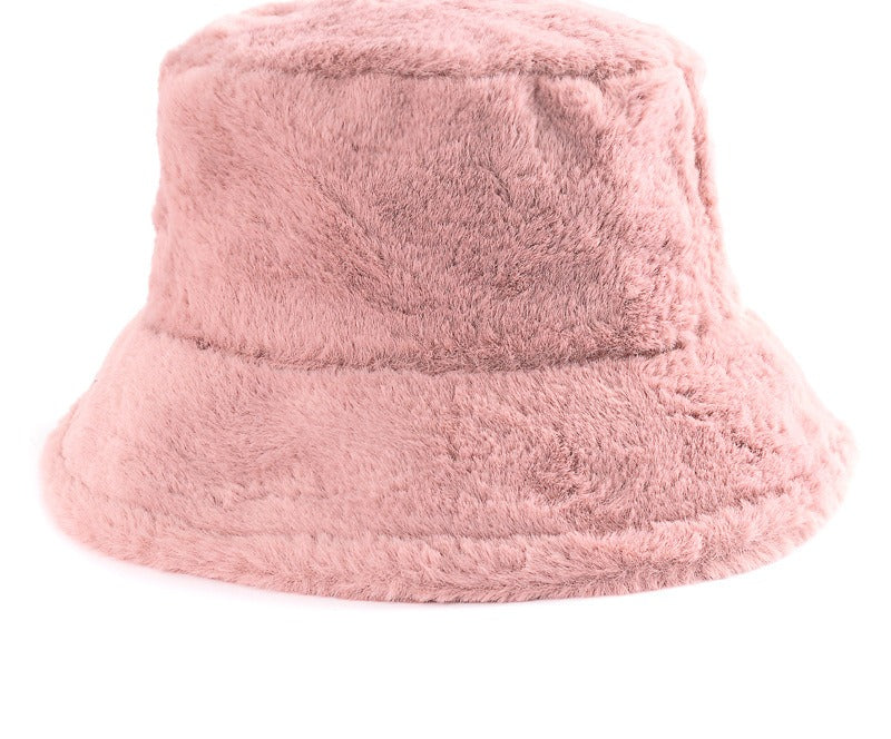 Pluizige bucket hat met koeienprint