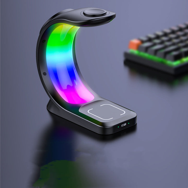 Zwart oplaadstation met RGB-licht en telefoon