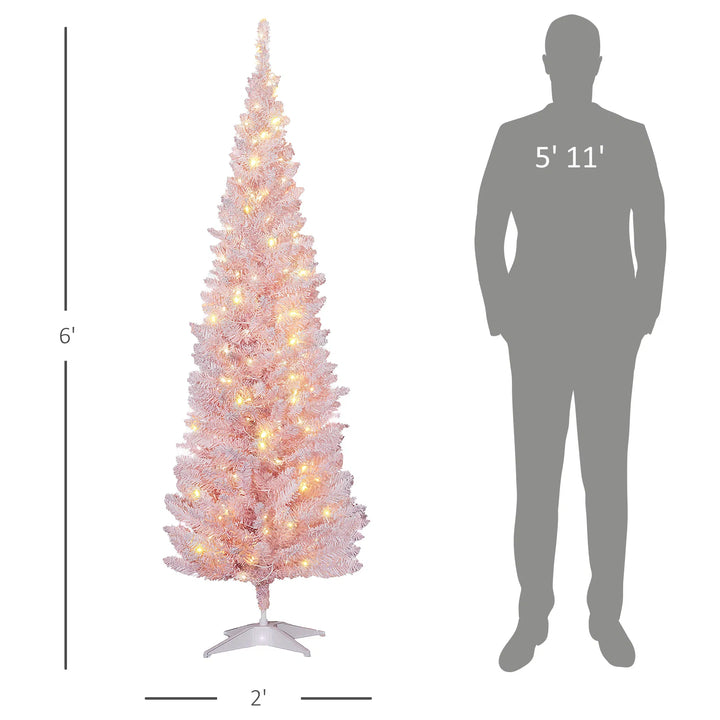 Roze slanke kerstboom met warm licht