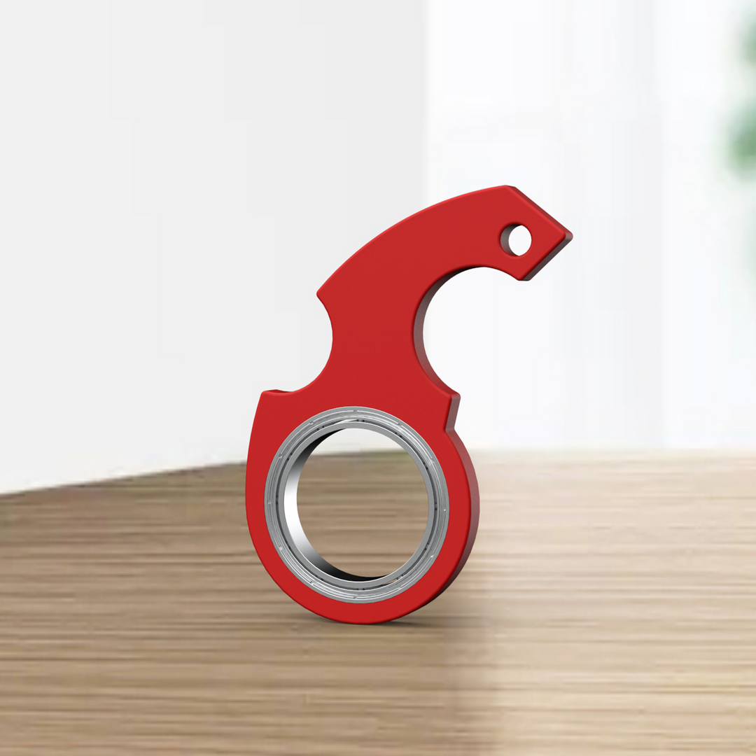 Rode fidget spinner sleutelhanger aan sleutelbos