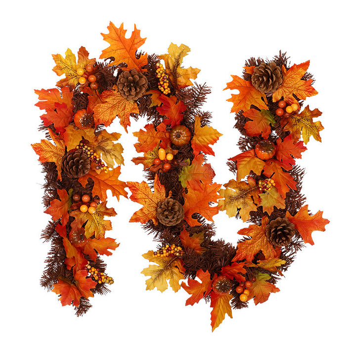 Warmteparadijs Herfstslinger met esdoornblad, dennenappels en besjes