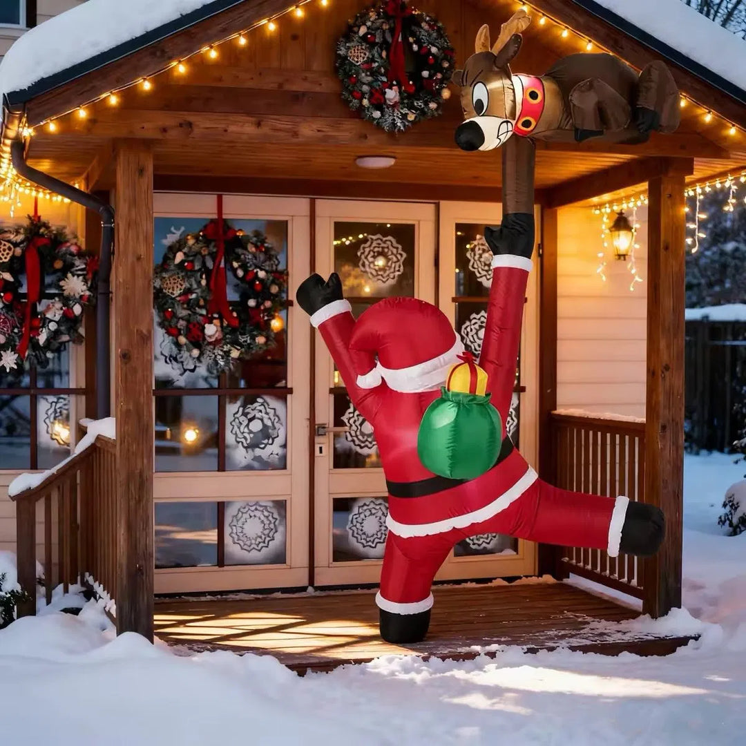 Opblaasbare kerstman met rendier die omhoog klimt
