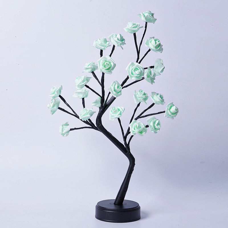 Rozenboom lamp met oplichtende roze rozen