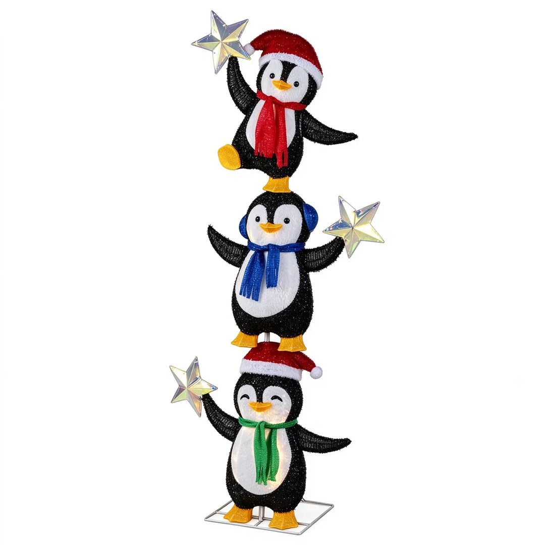 Verlichte figuur met drie pinguïns
