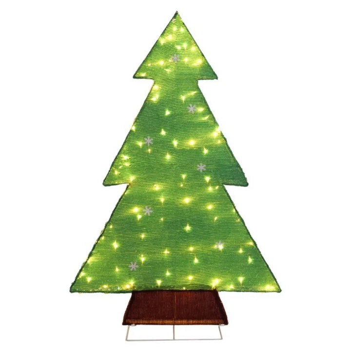 Verlichte kerstboom met sneeuwvlokken buiten