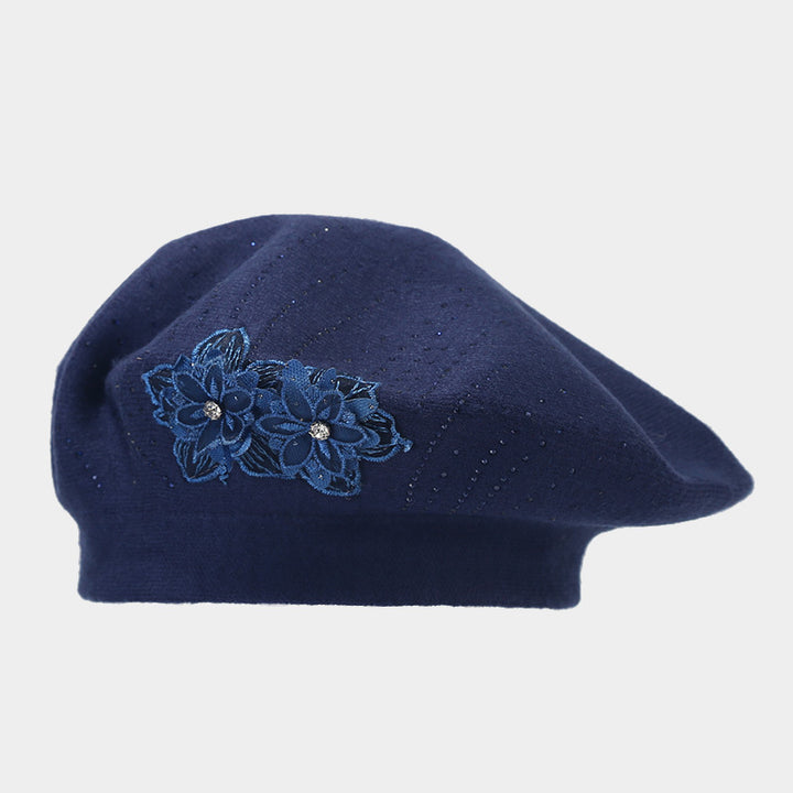 Gebreide baret met bloem en strass