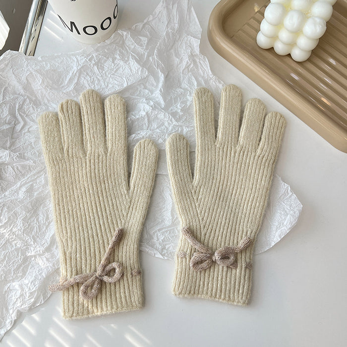 Warmteparadijs Geribde gebreide handschoenen met een strikje