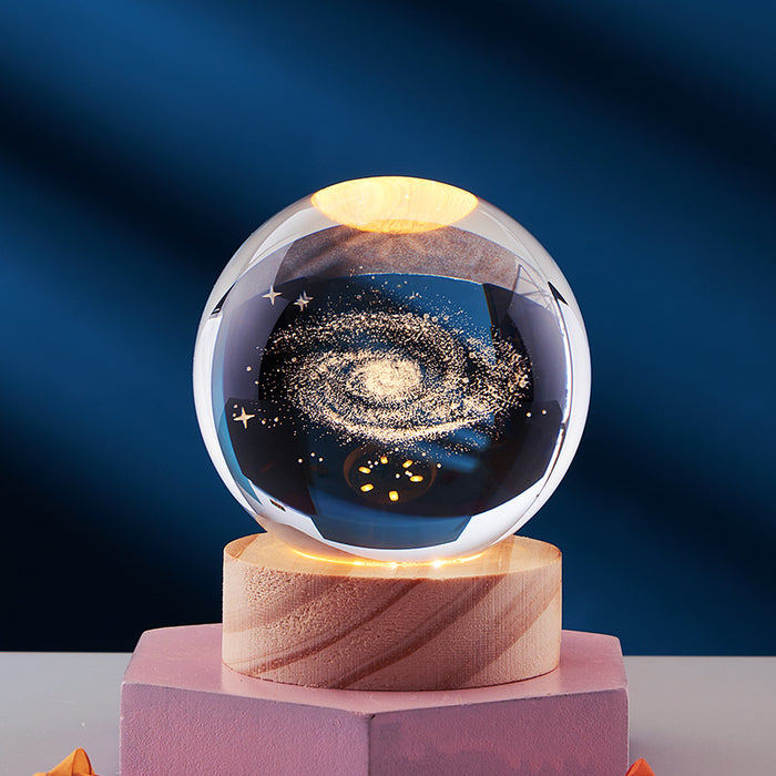Warmteparadijs Kristallen bol met 3D-gravure, los of met lichtvoet