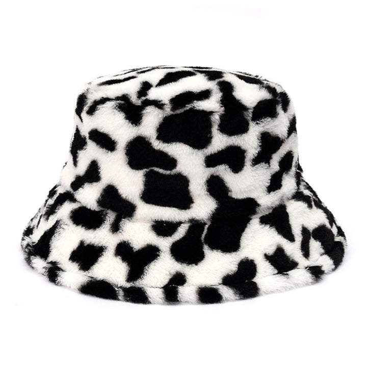 Pluizige bucket hat met koeienprint