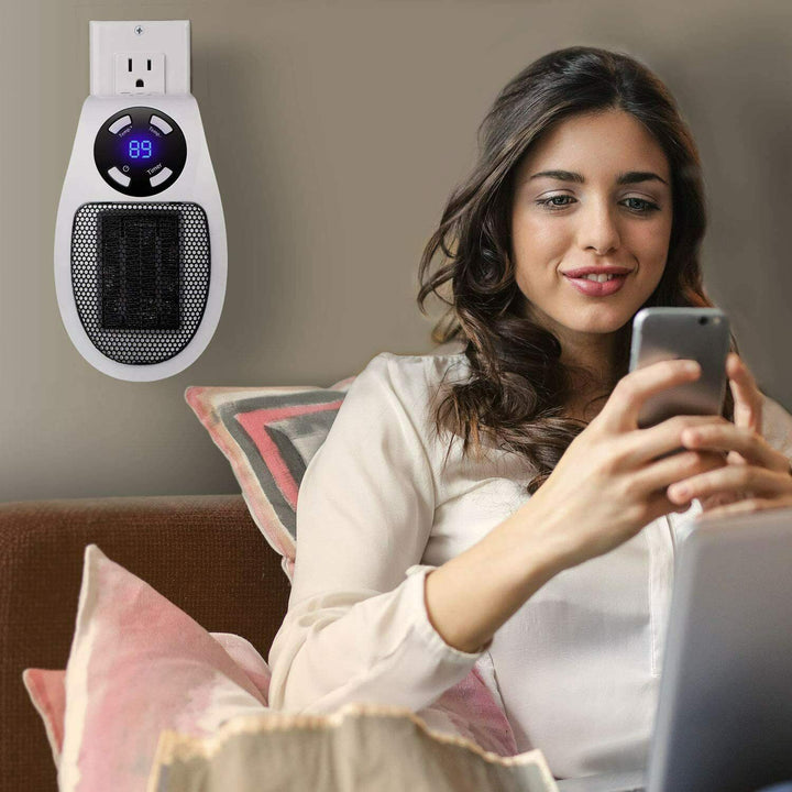 Warmteparadijs™ Mini stopcontactkachel met afstandsbediening en timer